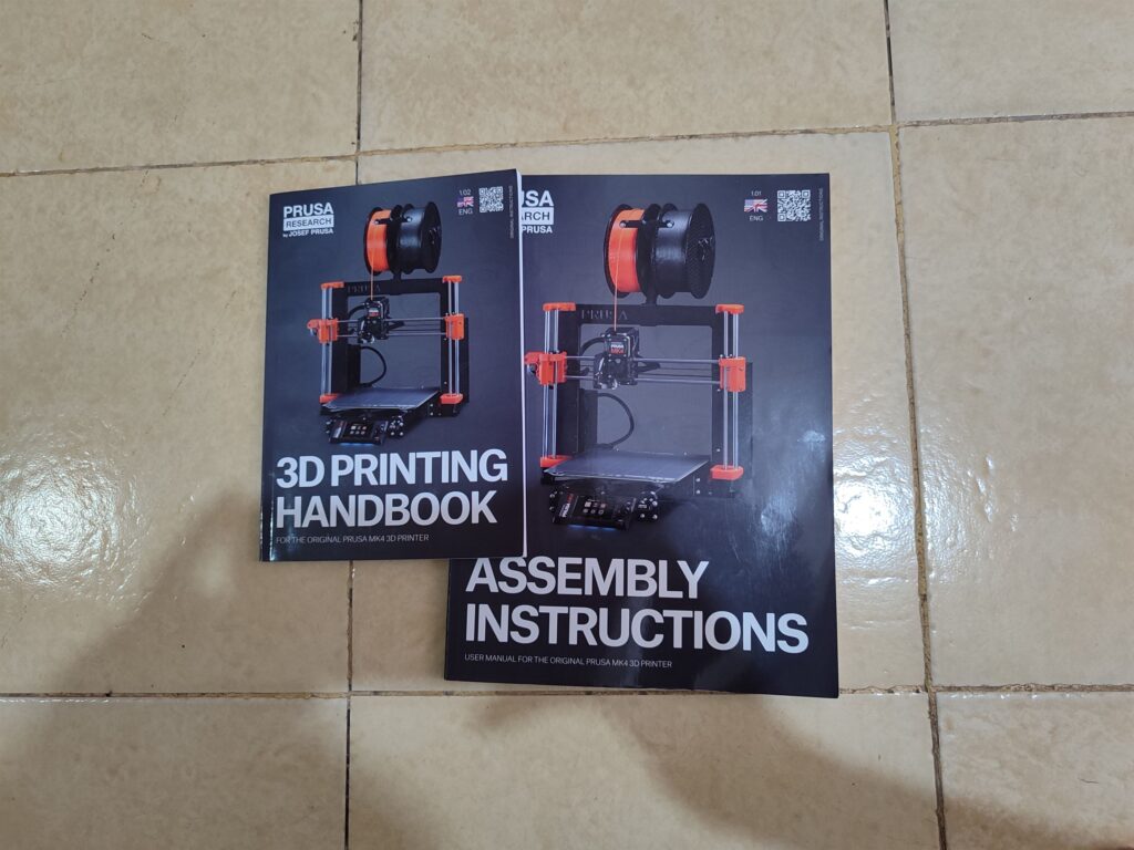 Image of Prusa's 3D printing handbook and assembly instructions booklets