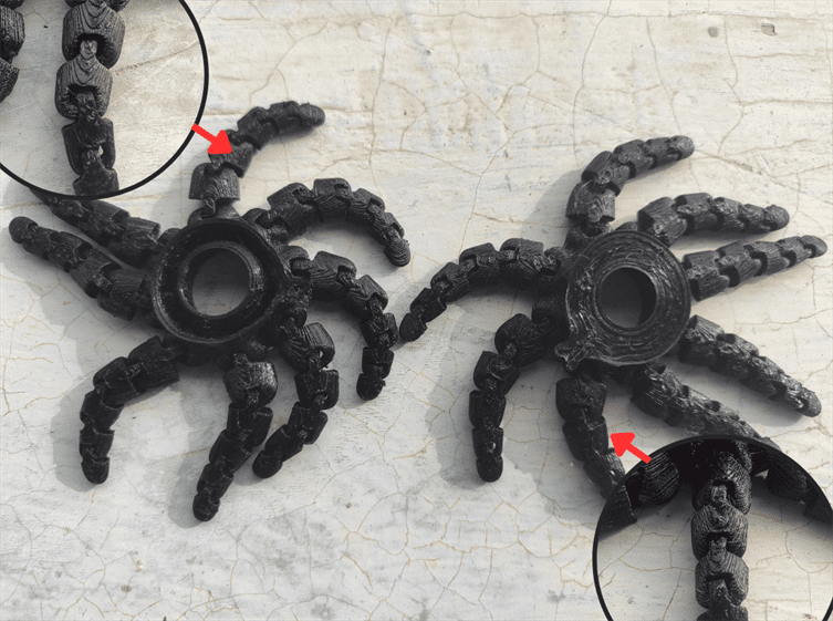 Image of two black 3D printed octopuses highlighting their tentacles.